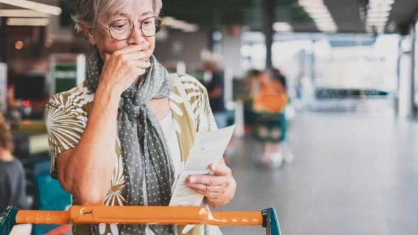 shopper checks her receipt