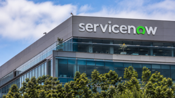 ServiceNow logo displayed on the exterior of a modern office building.
