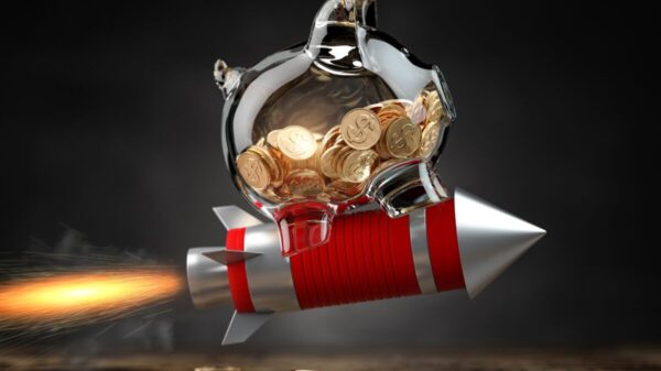 Piggy bank on a flying rocket